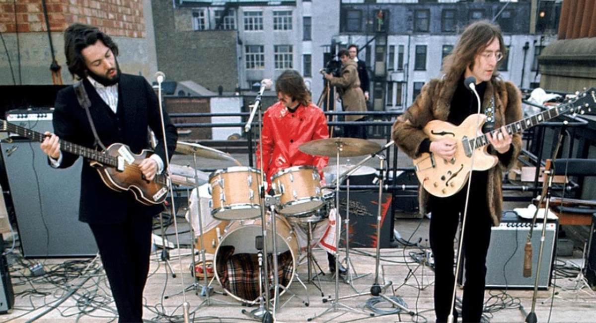 Paul McCartney, Ringo Starr, and John Lennon in 'The Beatles: Get Back - The Rooftop Concert.'