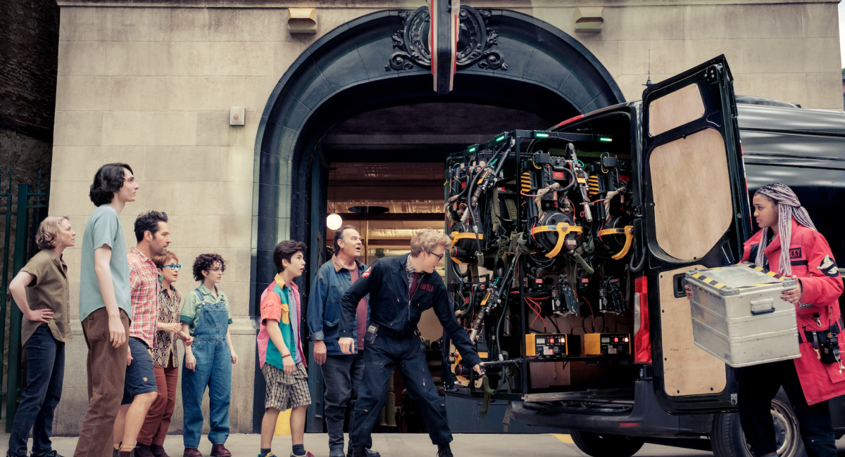 Callie (Carrie Coon), Trevor (Finn Wolfhard), Gary (Paul Rudd), Janine (Annie Potts), Phoebe (Mckenna Grace), Podcast (Logan Kim), Ray (Dan Aykroyd), Lars (James Acaster) and Lucky (Celeste O’Connor) in Columbia Pictures’ 'Ghostbusters: Frozen Empire.'