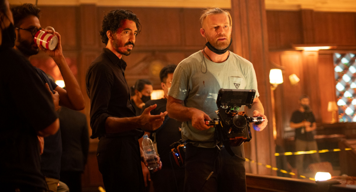 Director Dev Patel (center left) on the set of his film 'Monkey Man'.
