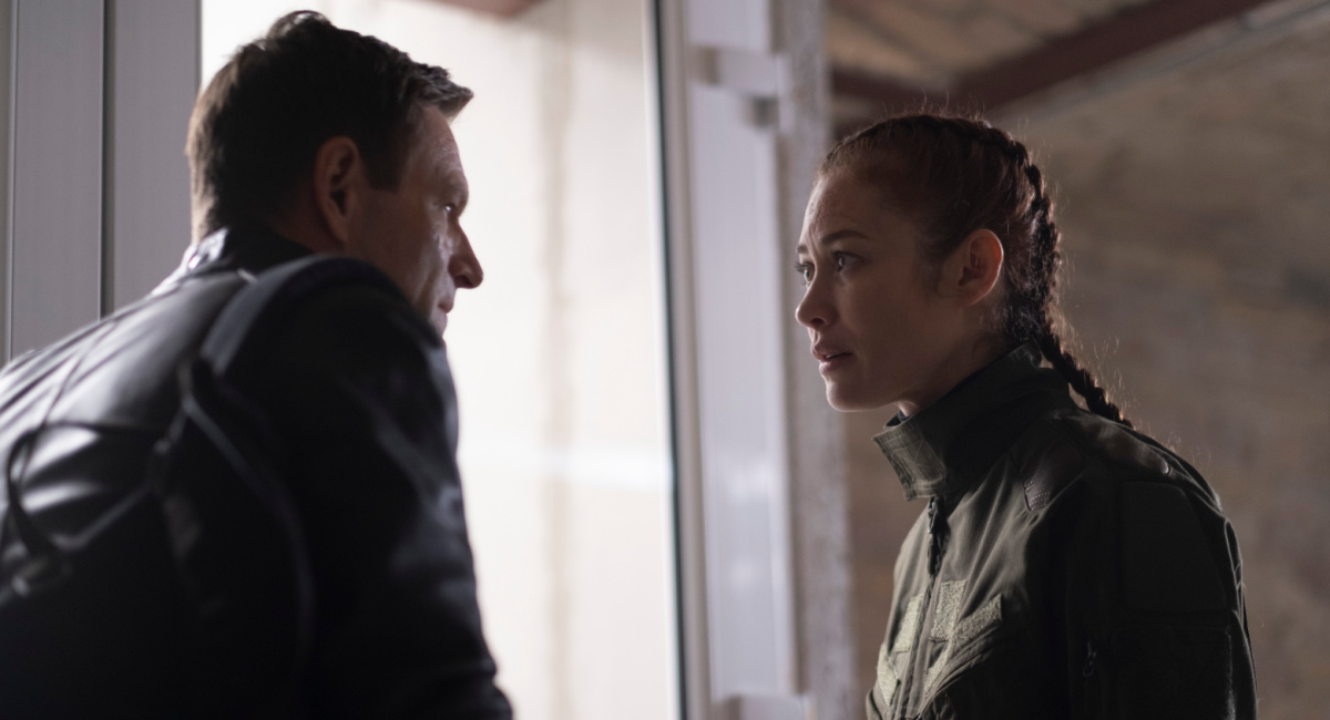 Aaron Eckhart and Olga Kurylenko in 'Chief of Station'.