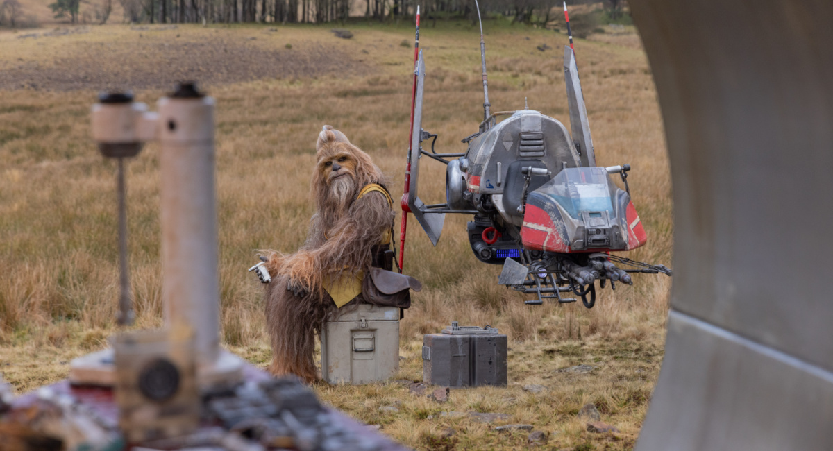 Jedi Master Kelnacca (Joonas Suotamo) sitting next to Jedi speeder bike in a scene from Lucasfilm's 'The Acolyte', exclusively on Disney+.