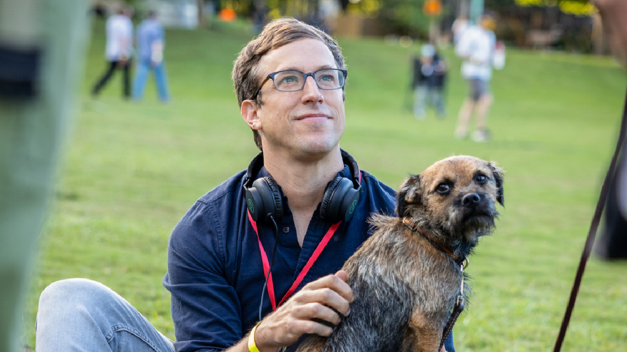 Director Josh Greenbaum with Reggie on the set of 'Strays.'