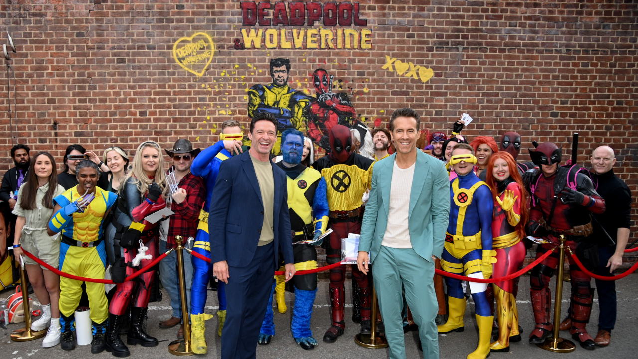 Hugh Jackman and Ryan Reynolds attend the UK Fan Event of Marvel Studios' 'Deadpool & Wolverine' at Eventim Apollo, London on July 11th, 2024.
