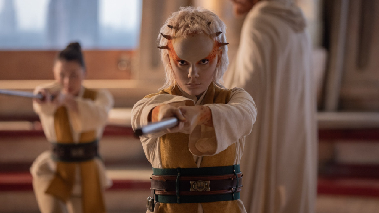 (Center to right) Jedi Padawan Jecki Lon (Dafne Keen) and Master Lakshay (Paul Bullion) in Lucasfilm's 'The Acolyte', exclusively on Disney+. ©2024 Lucasfilm Ltd. & TM. All Rights Reserved.
