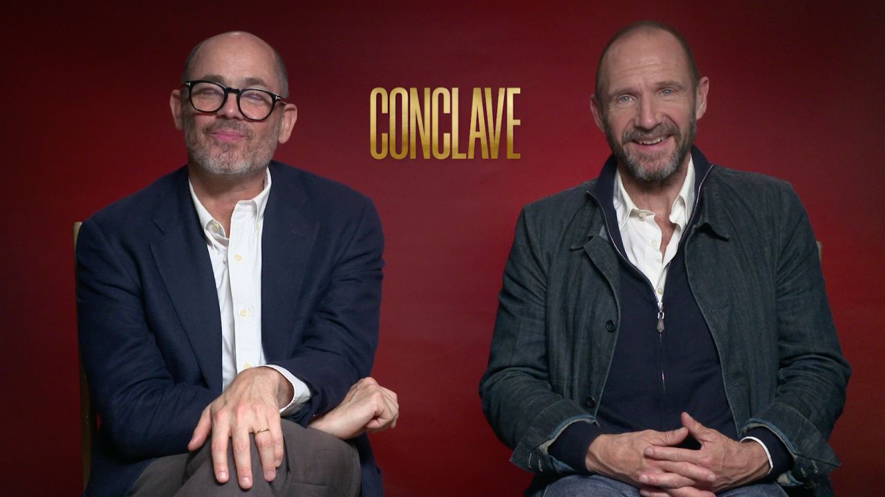 (L to R) Director Edward Berger and Ralph Fiennes talk 'Conclave'.