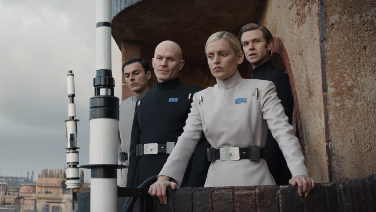 (L to R) Corv (Noof Ousellam), Lieutenant Keysax (Nick Moss), Supervisor Dedra Meero (Denise Gough) and Captain Vanis Tigo (Wilf Scolding) in Lucasfilm's 'Andor', exclusively on Disney+. ©2022 Lucasfilm Ltd. & TM. All Rights Reserved.