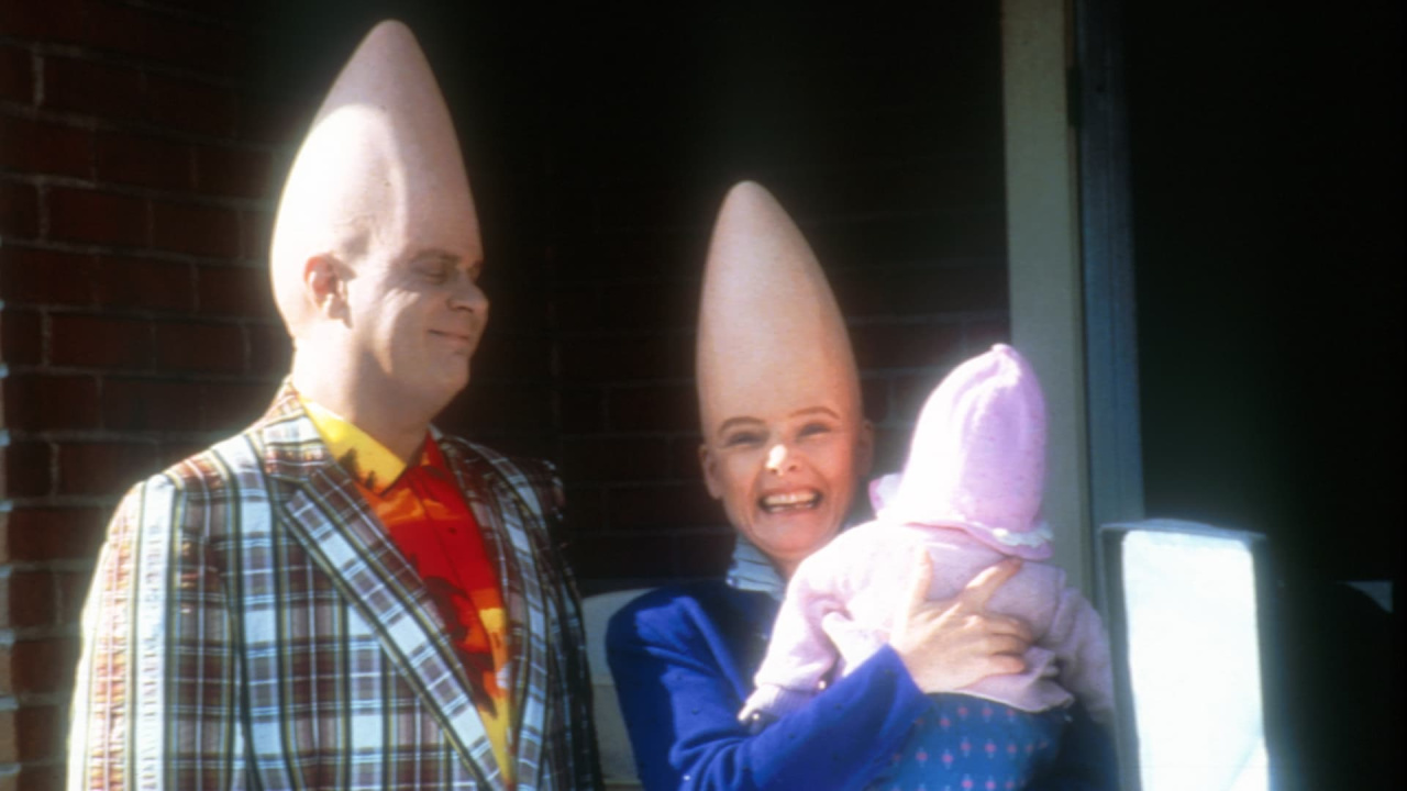(L to R) Dan Aykroyd and Jane Curtin in 'Coneheads'. Photo: Paramount Pictures.