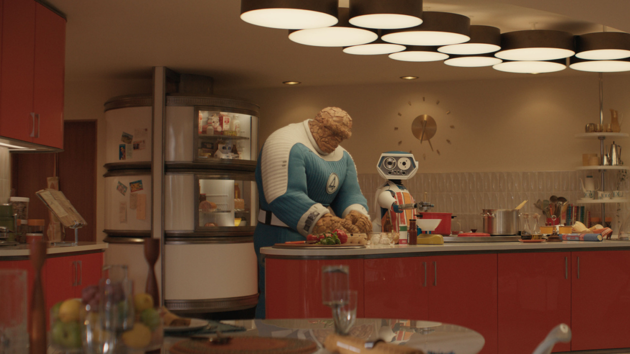 (L to R) Ebon Moss-Bachrach as Ben Grimm/The Thing and H.E.R.B.I.E in 20th Century Studios/Marvel Studios' 'Fantastic Four: First Steps'. Photo courtesy of 20th Century Studios/Marvel Studios. © 2025 20th Century Studios / © and ™ 2025 Marvel.