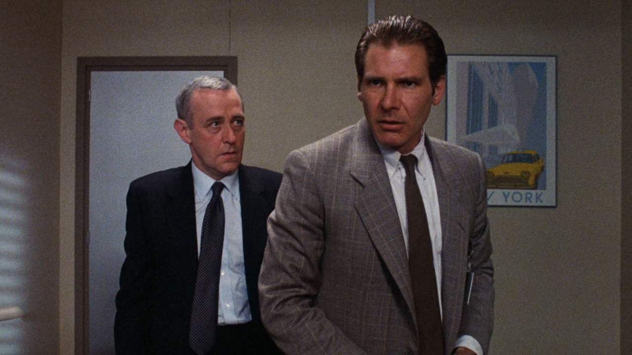 (L to R) John Mahoney and Harrison Ford in 'Frantic'. Photo: Warner Bros.