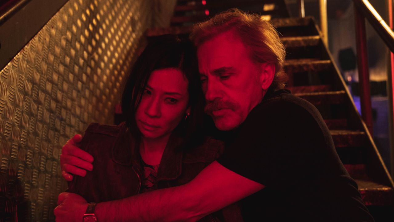 (L to R) Lucy Liu and Christoph Waltz in the Action/Comedy film 'Old Guy', a The Avenue release. Photo courtesy of The Avenue.