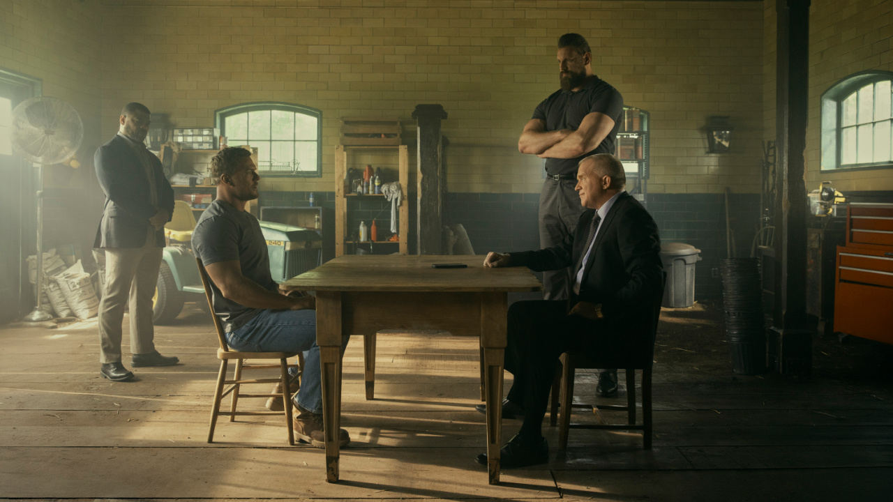 (L to R) Donald Sales, Alan Ritchson (Jack Reacher), Olivier Richters (Paulie), Anthony Michael Hall (Zachary Beck) in 'Reacher' Season 3. Credit: Jasper Savage/Prime. Copyright: © Amazon Content Services LLC.