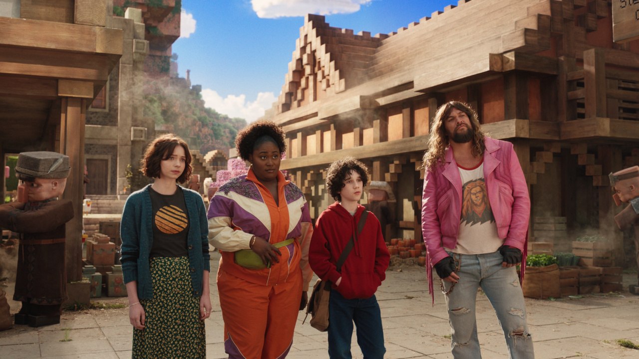 (L to R) Emma Myers as Natalie, Danielle Brooks as Dawn, Sebastian Hansen as Henry and Jason Momoa as Garrett in Warner Bros. Pictures’ and Legendary Pictures’ 'A Minecraft Movie,' a Warner Bros. Pictures release. Photo Credit: Courtesy Warner Bros. Pictures. Copyright: © 2025 Warner Bros. Entertainment Inc. All Rights Reserved.