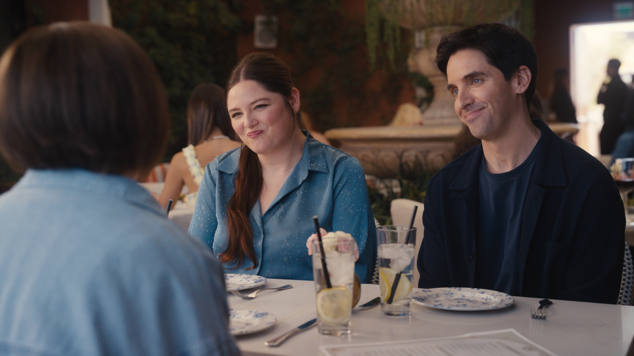 (L to R) Meg Stalter and Paul W. Downs in Season 4 of 'Hacks'. Photograph by Courtesy of Max.