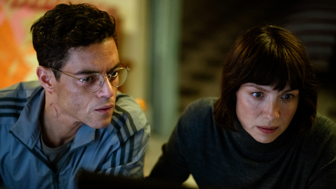 (L to R) Rami Malek and Caitríona Balfe in 'The Amateur'. Photo courtesy of 20th Century Studios. © 2024 20th Century Studios. All Rights Reserved.