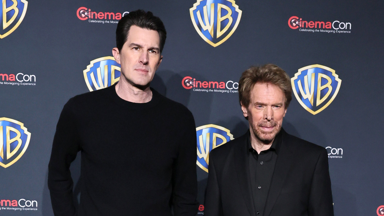 (L to R) Director Joseph Kosinski and producer Jerry Bruckheimer at CinemaCon 2025. Photo: Warner Bros.