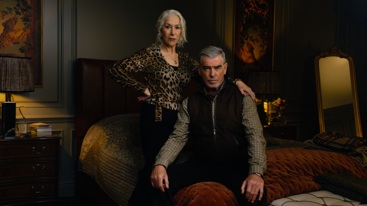 (L to R) Helen Mirren as Maeve Harrigan and Pierce Brosnan as Conrad Harrigan in 'MobLand'. Streaming on Paramount+ 2025. Photo: Jason Bell/Paramount+.