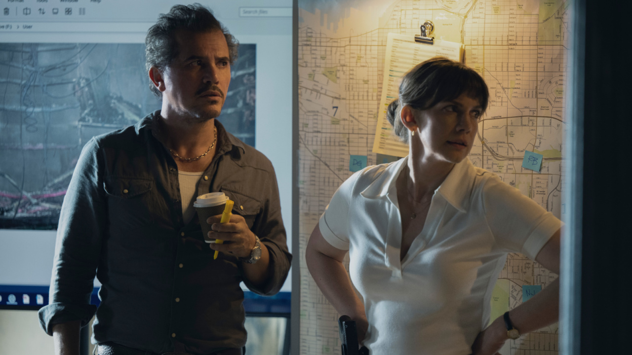 (L to R) John Leguizamo and Anna Chlumsky in 'Smoke,' premiering June 27, 2025 on Apple TV+.