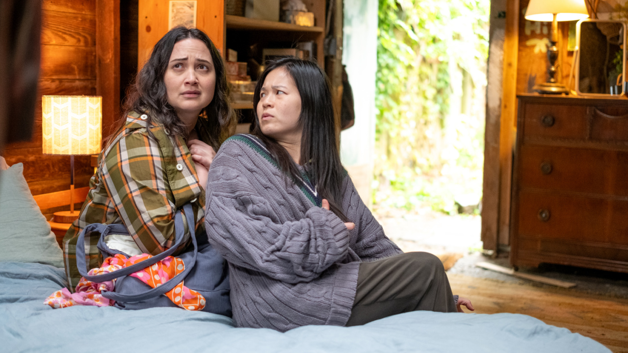 (L to R) Lily Gladstone and Kelly Marie Tran in Bleecker Street's 'The Wedding Banquet'. Credit: Bleecker Street / ShivHans Pictures.