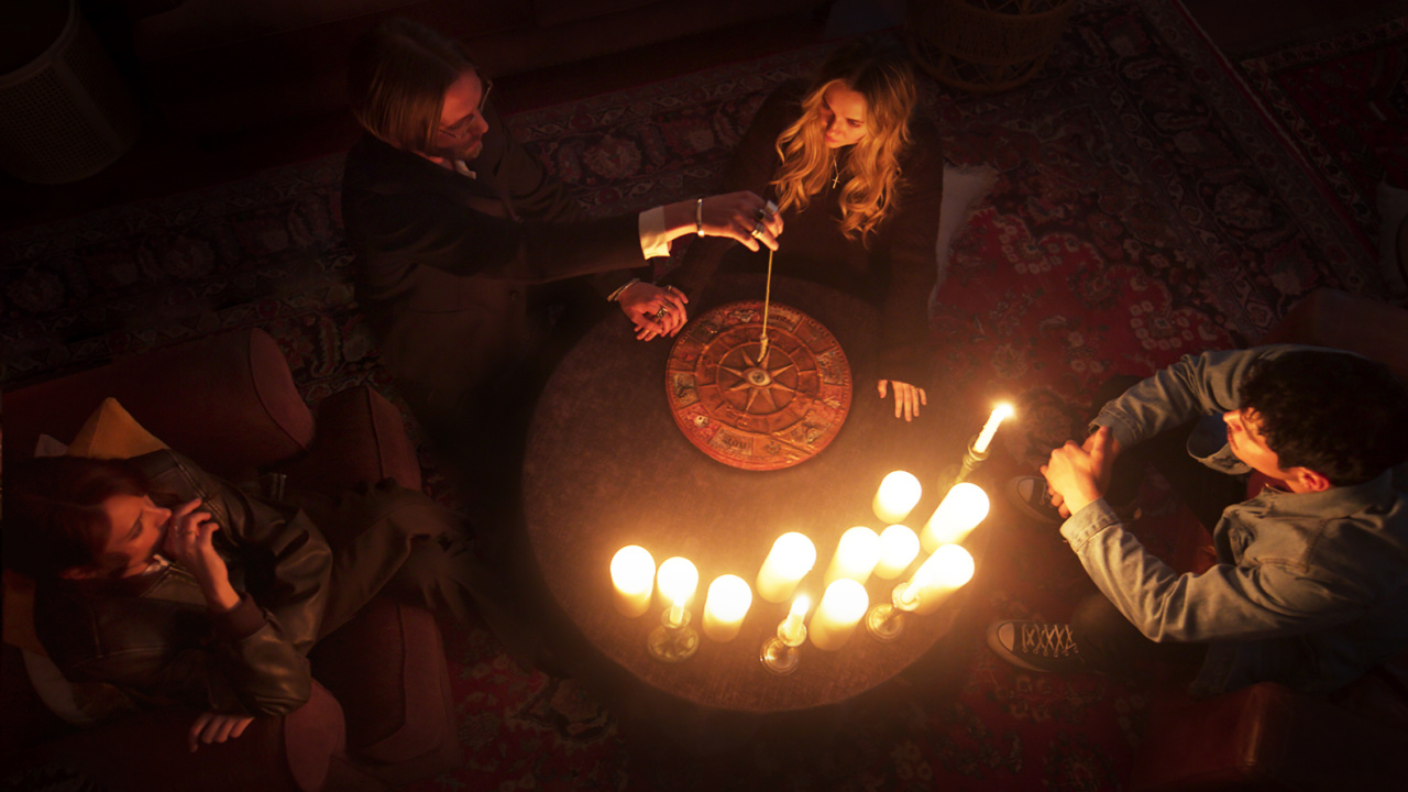 (L to R) Mel Jarnson as “Brooke,” Jamie Campbell Bower as “Alexander Babtiste,” Madison Iseman as “Emily,” and Aaron Dominguez as “Christian” in the Horror film 'Witchboard', a The Avenue release. Photo courtesy of The Avenue.