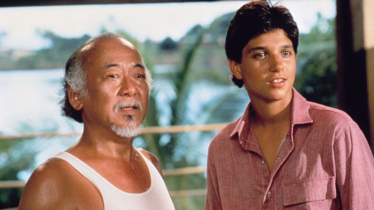 (L to R) Pat Morita as Mr. Miyagi and Ralph Macchio as Daniel LaRusso in 'The Karate Kid Part II.' Photo: Columbia Pictures.