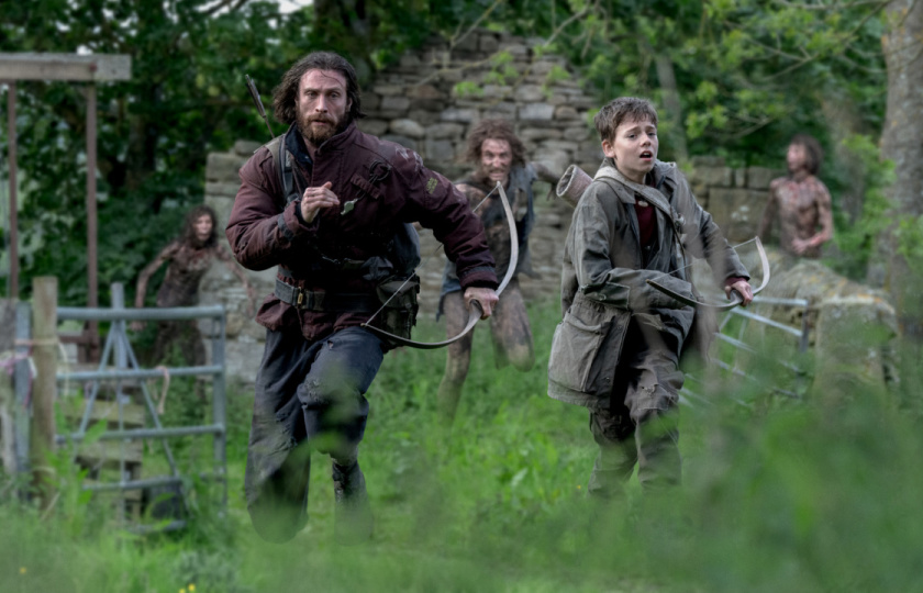 (L to R) Jamie (Aaron Taylor-Johnson) and his son Spike (Alfie Williams) in Columbia Pictures' '28 Years Later'. Photo: Sony Pictures.