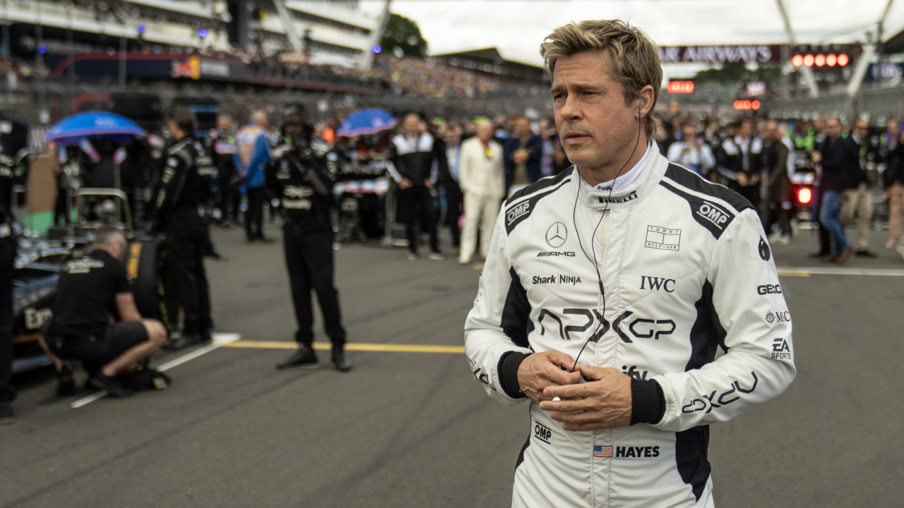 Brad Pitt as Sonny Hayes in Apple Original Films’ 'F1', a Warner Bros. Pictures release. Photo Credit: Photo by Scott Garfield. Courtesy Warner Bros Pictures / Apple Original Films. Copyright: © 2025 Warner Bros. Entertainment Inc. All Rights Reserved.