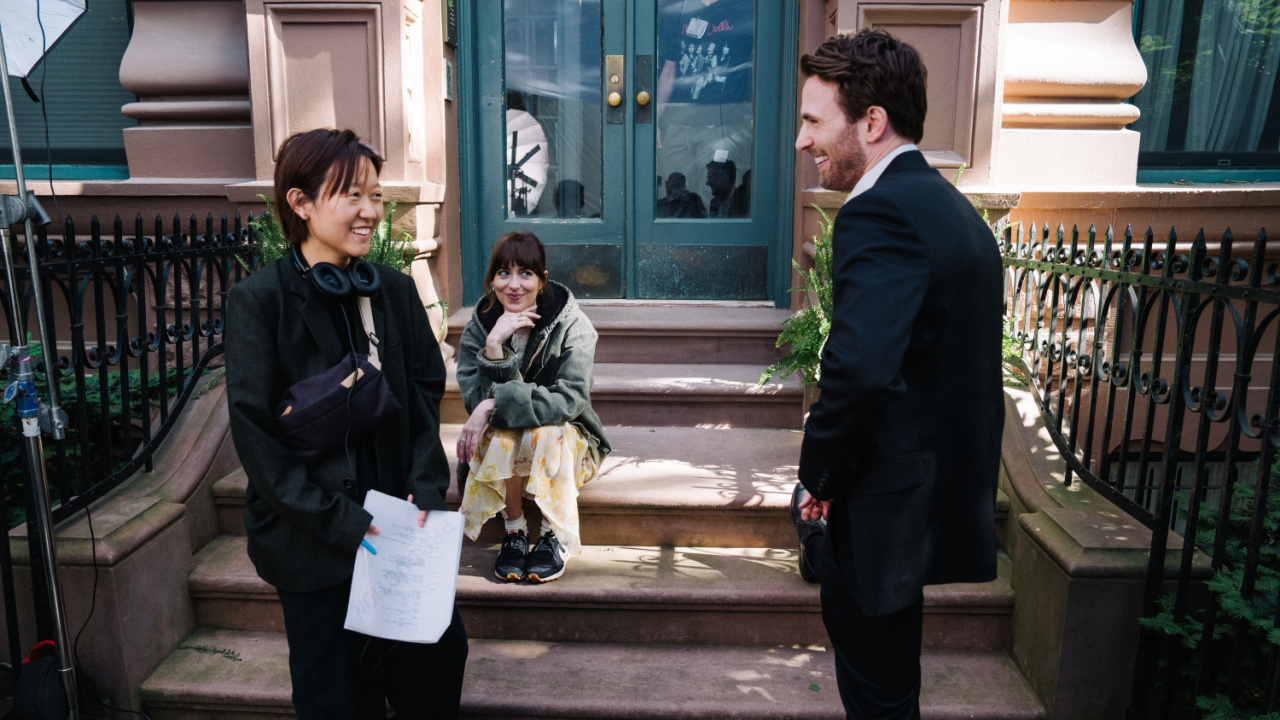 (L to R) Director Celine Song, Dakota Johnson and Chris Evans on the set of 'Materialists'. Credit: Atsushi Nishijima.