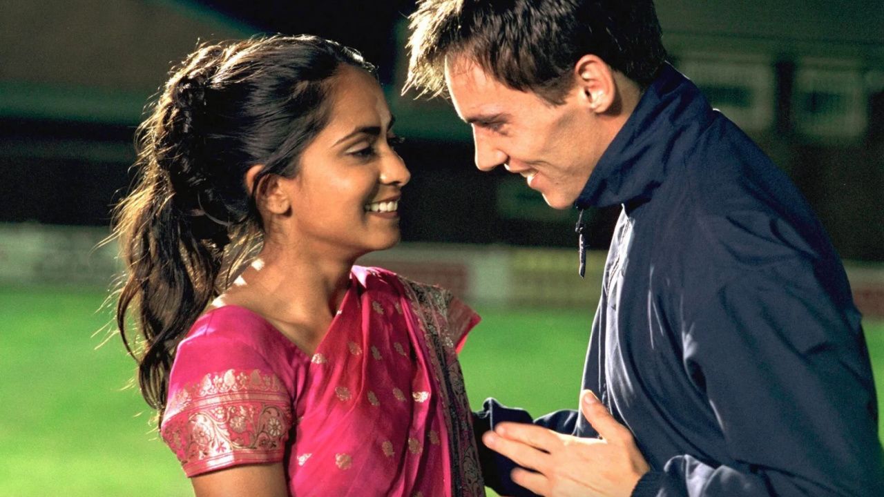 (L to R) Parminder Nagra and Jonathan Rhys Meyers in 'Bend It Like Beckham'. Photo: Fox Searchlight Pictures.
