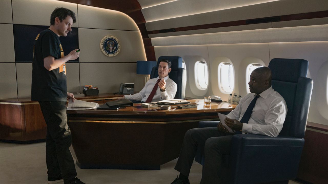 (L to R): Ilya Naishuller, John Cena and Idris Elba on the set of ‘Heads of State’. Photo: Chiabella James/Prime.  © 2023 Amazon Content Services LLC.