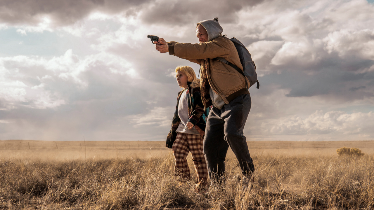 (L to R) Ana Sophia Heger and Taron Egerton in 'She Rides Shotgun'. Photo: Lionsgate.