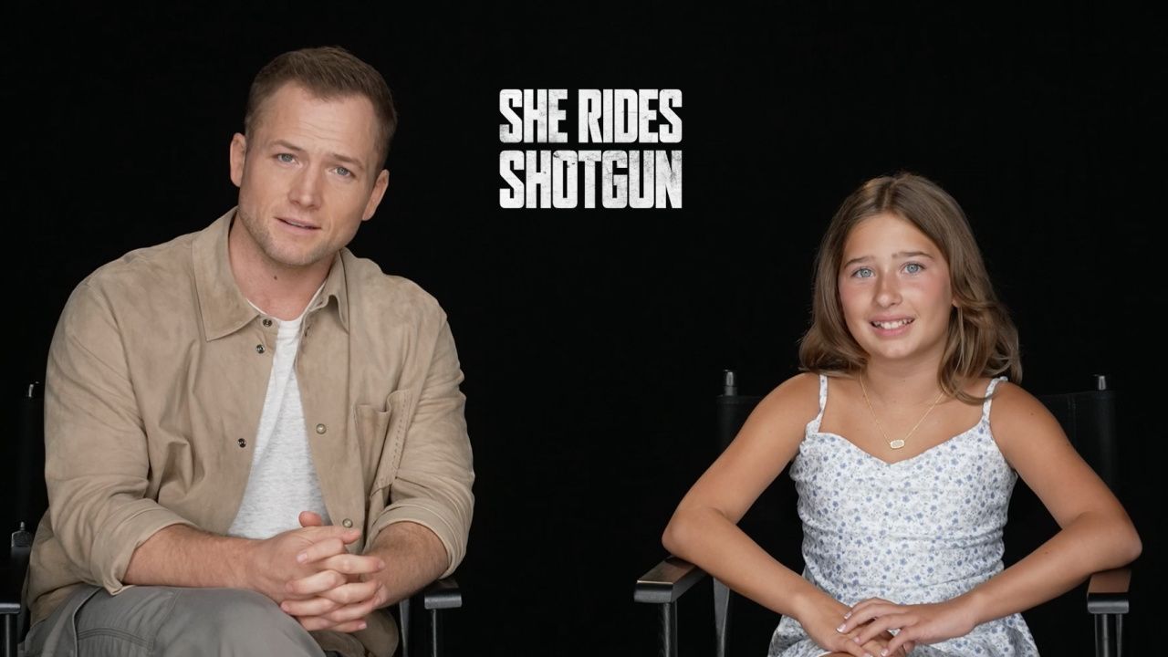 (L to R) Taron Egerton and Ana Sophia Heger star in 'She Rides Shotgun'.