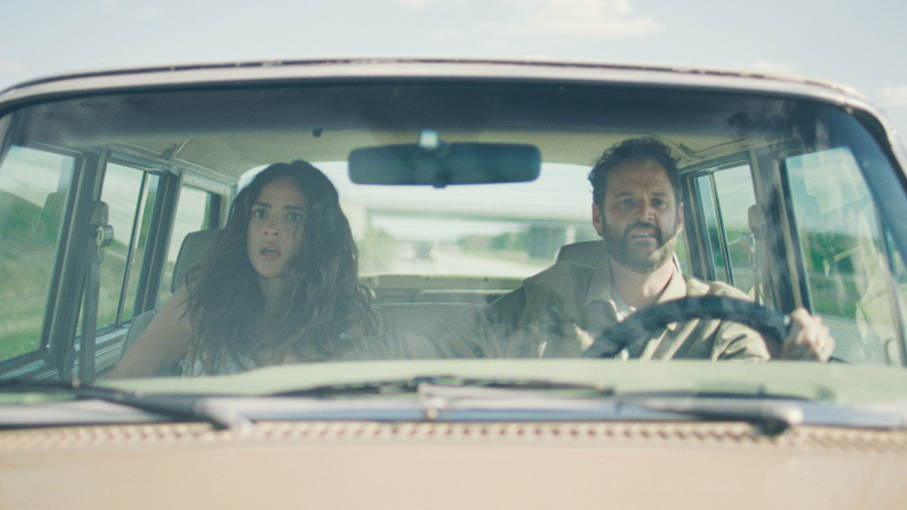 (L to R) Adria Arjona and Kyle Marvin in 'Splitsville'. Photo: Neon.