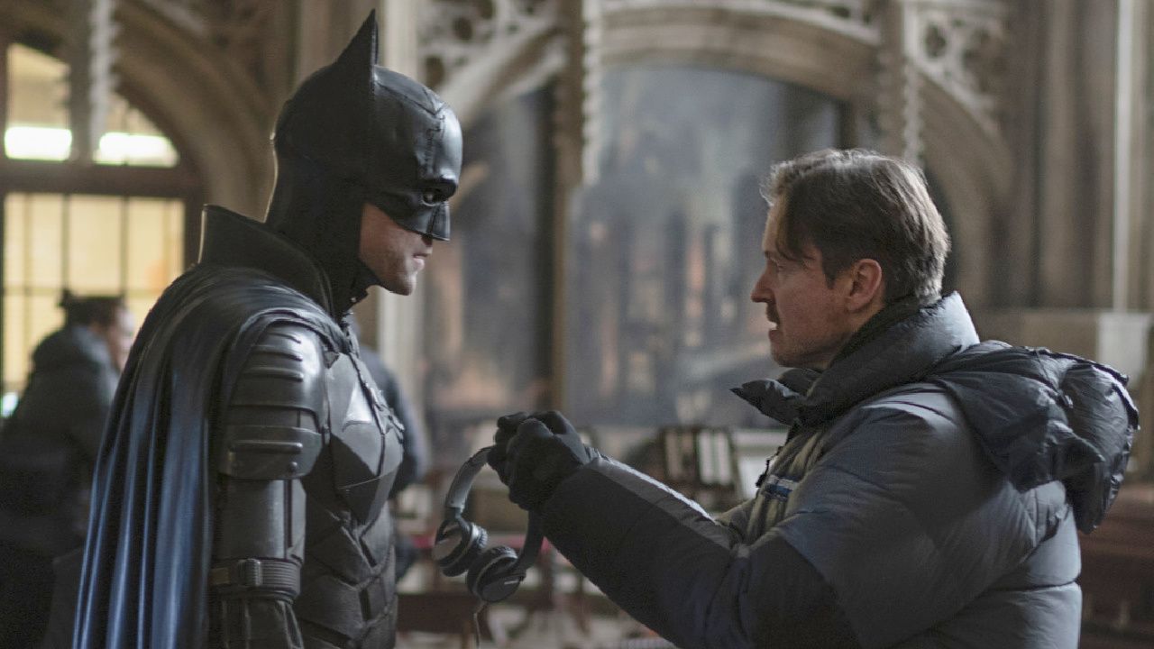 (L to R) Robert Pattinson and director Matt Reeves on the set in Warner Bros. Pictures’ action adventure 'The Batman,' a Warner Bros. Pictures release. Photo Credit: Jonathan Olley/™ & © DC Comics. Copyright: © 2021 Warner Bros. Entertainment Inc. All Rights Reserved.