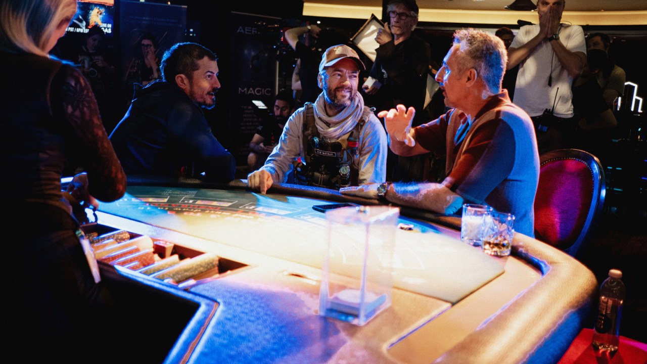 (L to R) Orlando Bloom, Director Sean Ellis and John Turturro on set of the psychological thriller film, 'The Cut'. Photo courtesy of Republic Pictures (a Paramount Pictures label).