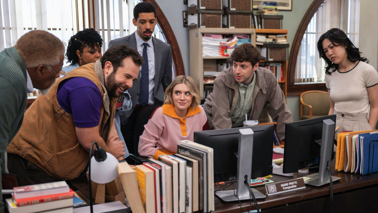 (L to R) Duane R. Shepard as Barry, Gbemisola Ikumelo as Adelola, Eric Rahill as Travis, Melvin Gregg as Detrick, Chelsea Frei as Mare, Alex Edelman as Adam, Ramona Young as Nicole in ‘The Paper’. Photo: John P. Fleenor/Peacock.