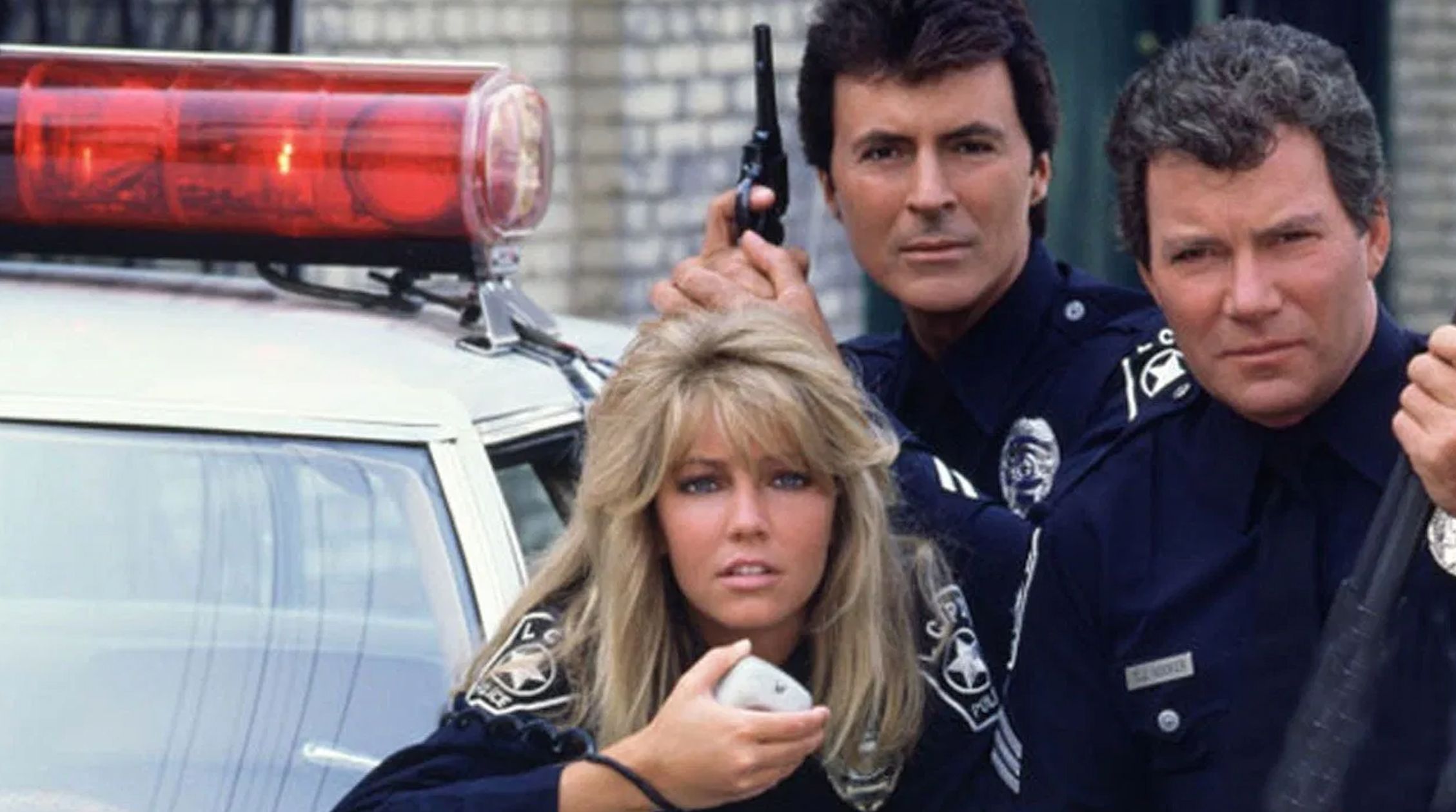 (L to R) Heather Locklear, James Darren and William Shatner in 'T. J. Hooker'. Photo: Spelling-Goldberg Productions.