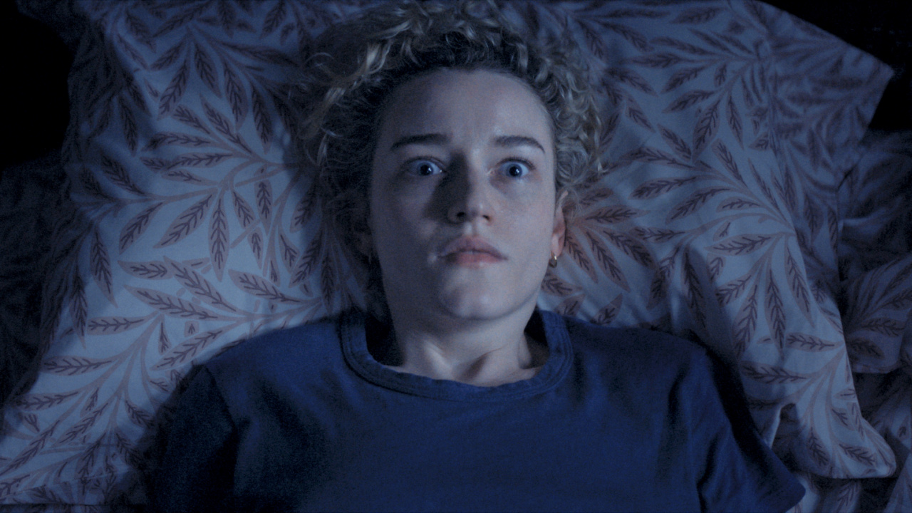 Julia Garner as Justine in New Line Cinema’s 'Weapons,' a Warner Bros. Pictures release. Photo Credit: Photo Courtesy Warner Bros. Pictures. Copyright: © 2025 Warner Bros. Entertainment Inc. All Rights Reserved.