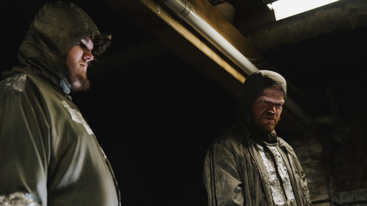 (L to R) Aidan Delbis as Don and Jesse Plemons as Teddy in director Yorgos Lanthimos' 'Bugonia', a Focus Features release. Credit: Atsushi Nishijima/Focus Features © 2025 All Rights Reserved.