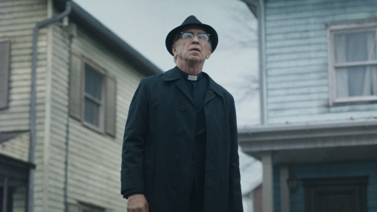 Steve Coulter as Father Gordon in New Line Cinema’s 'The Conjuring: Last Rites,' a Warner Bros. Pictures release. Photo Credit: Courtesy of Warner Bros. Pictures. Copyright: © 2025 Warner Bros. Entertainment Inc. All Rights Reserved.