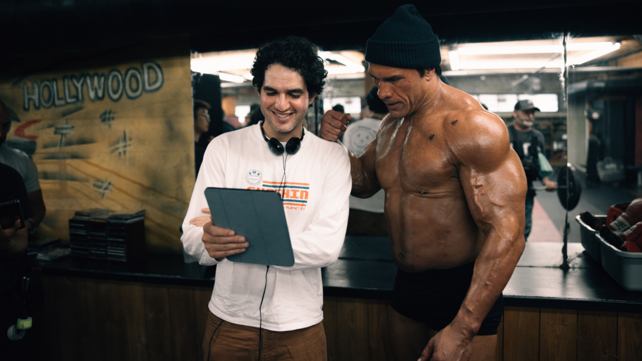(L to R) Director Benny Safdie and Dwayne Johnson and on the set of 'The Smashing Machine'. Photo: A24.