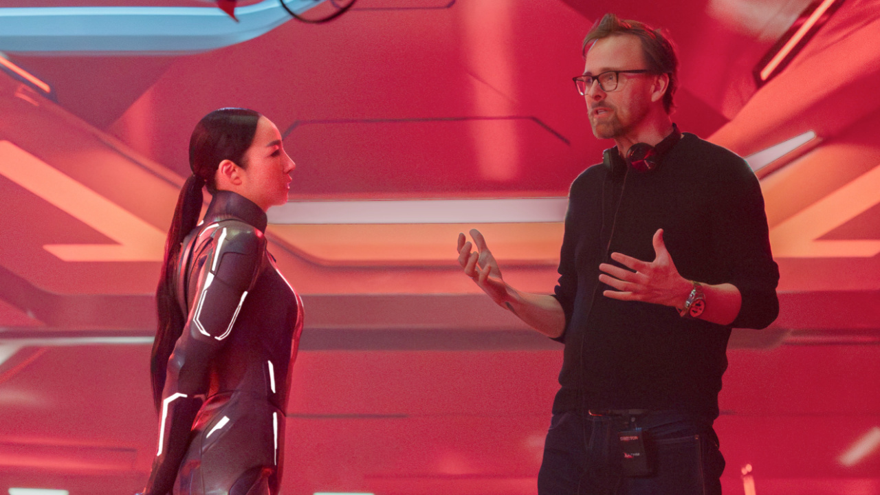 (L to R) Greta Lee and Director Joachim Rønning on the set of Disney's Live Action 'Tron: Ares'. Photo by Leah Gallo. © 2025 Disney Enterprises, Inc. All Rights Reserved.