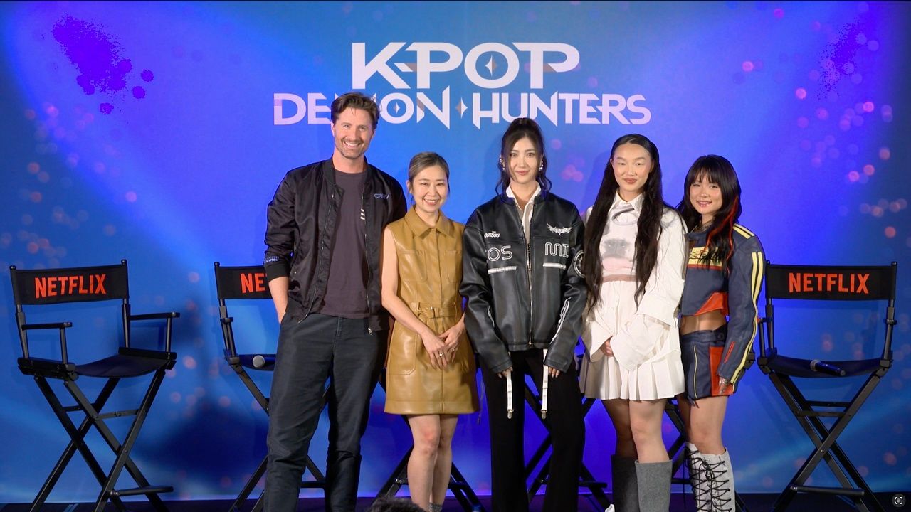 (L to R) Chris Appelhans (Director/Writer), Maggie Kang (Director/Writer), EJAE (Vocalist - Rumi / Songwriter, “Golden,” “How It’s Done,” “Your Idol” & “Hunter’s Mantra”), AUDREY NUNA (Vocalist - Mira), and REI AMI (Vocalist - Zoey) attend the press conference for Netflix's 'KPop Demon Hunters'. Photo: Netflix