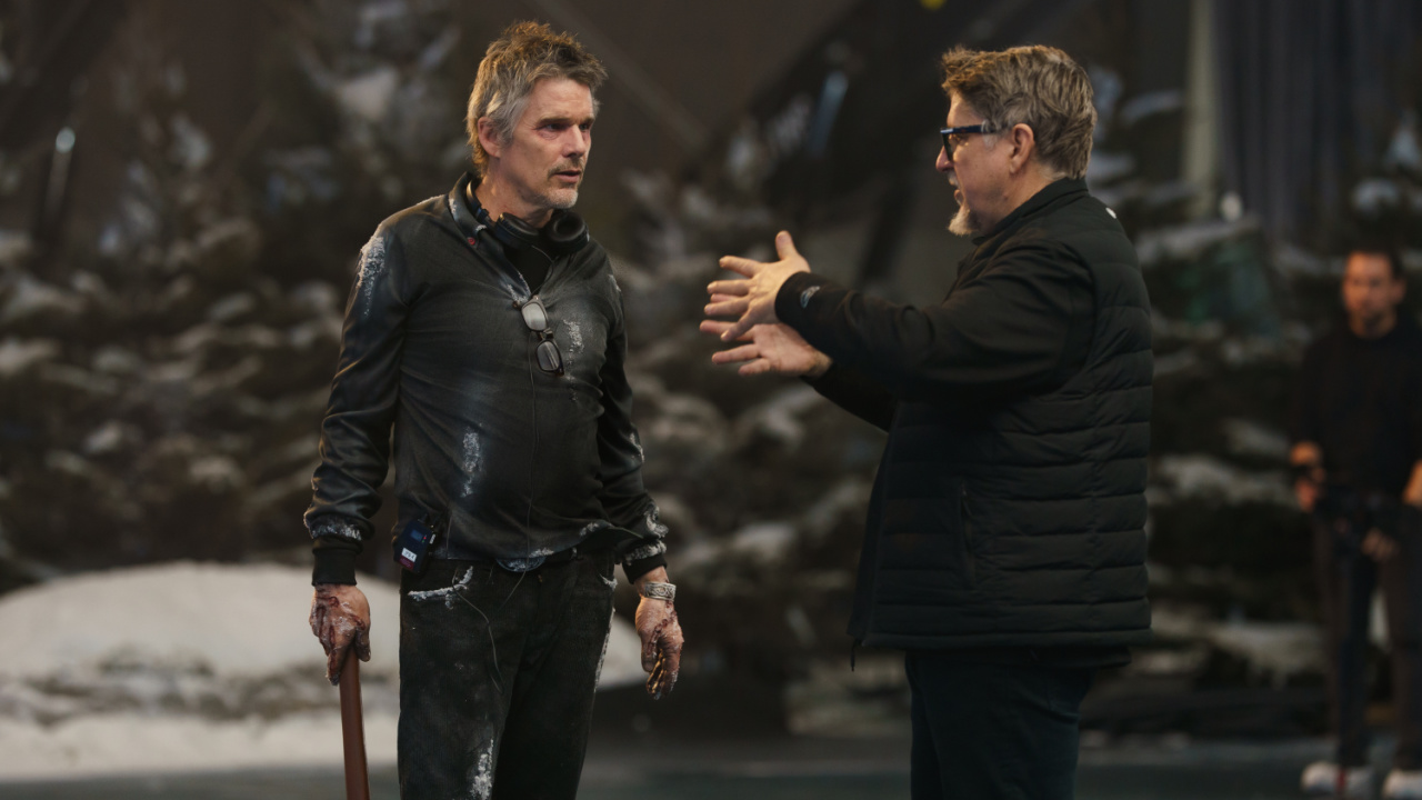 (L to R) Ethan Hawke and director Scott Derrickson on the set of 'Black Phone 2'. Photo: Universal Pictures.
