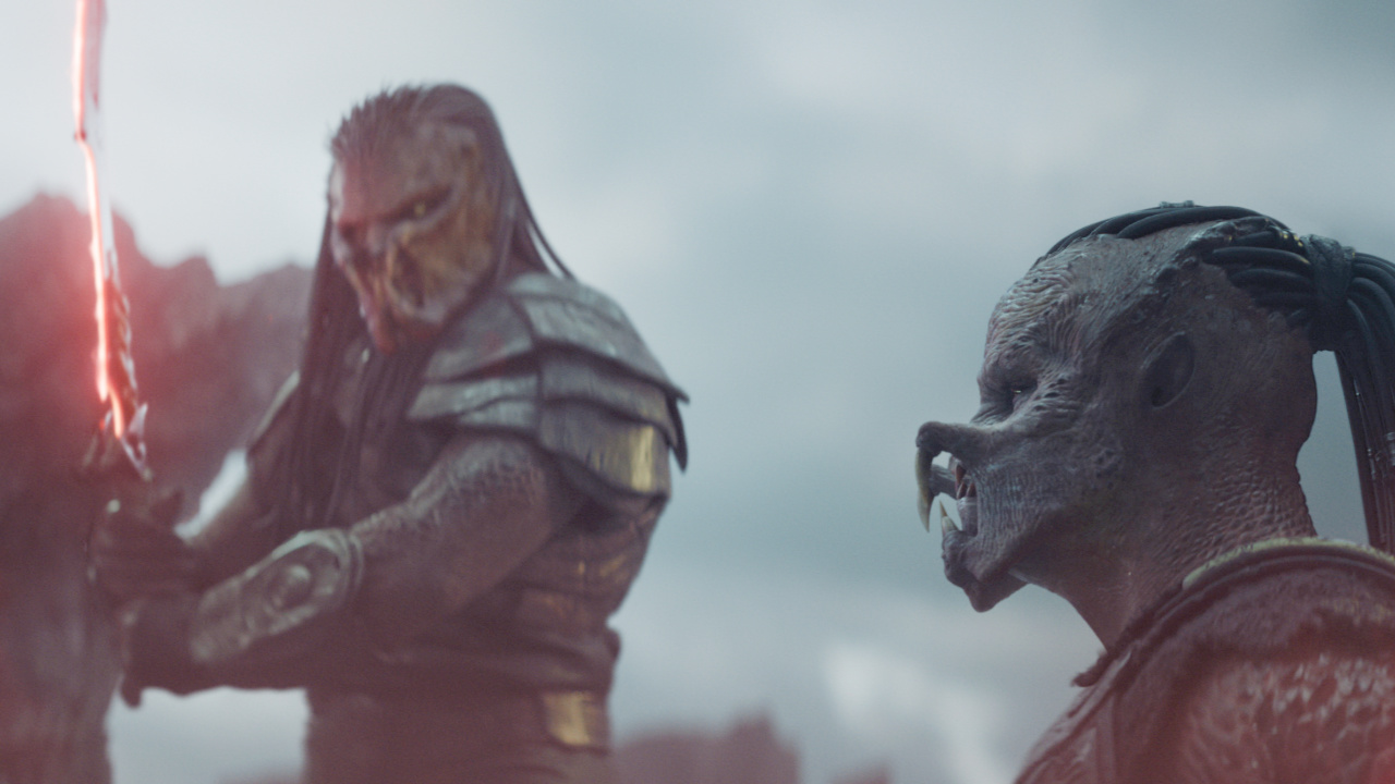 (L to R) Kwei (Mike Homik) and Dek (Dimitrius Schuster-Koloamatangi) in 20th Century Studios' 'Predator: Badlands' film. Photo courtesy of 20th Century Studios. © 2025 20th Century Studios. All Rights Reserved.