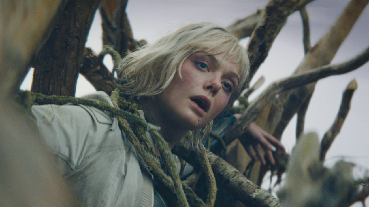 Thia (Elle Fanning) in 20th Century Studios' 'Predator: Badlands' film. Photo courtesy of 20th Century Studios. © 2025 20th Century Studios. All Rights Reserved.