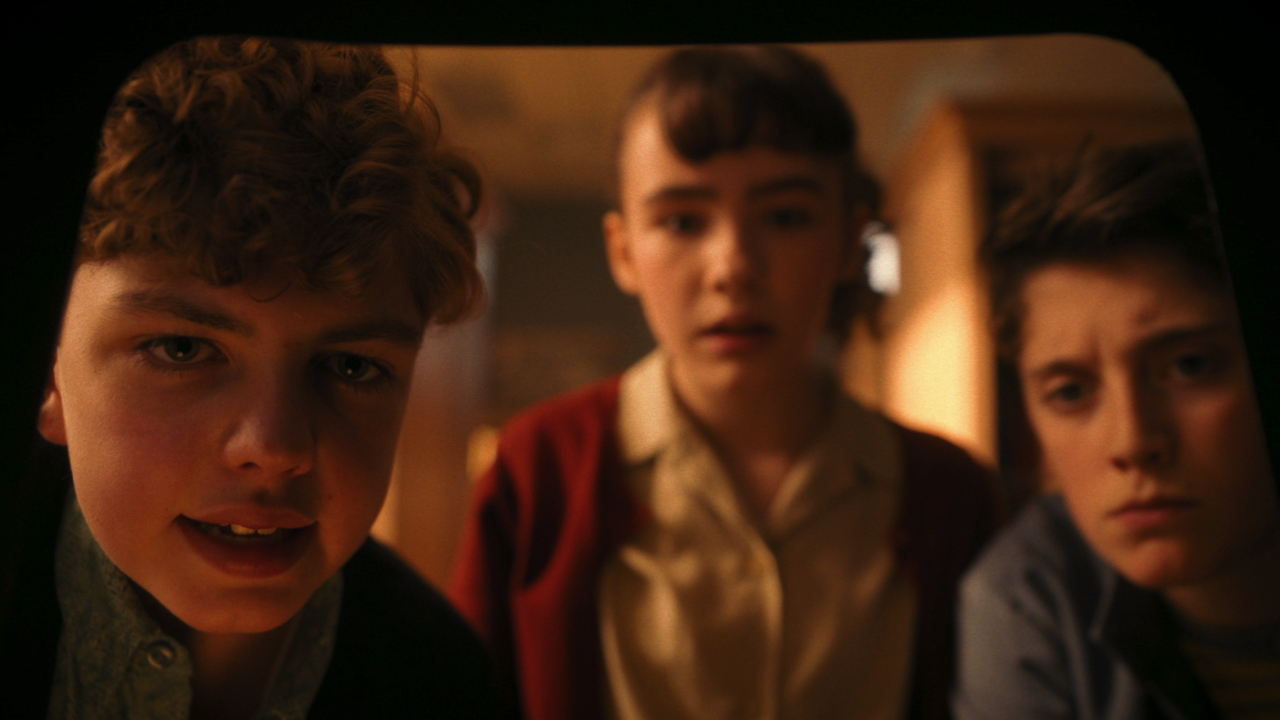 (L to R): Mikkal Karim-Fidler, Clara Stack and Jack Molloy Legault in ‘IT: Welcome to Derry’. Photo: Brooke Palmer/HBO.