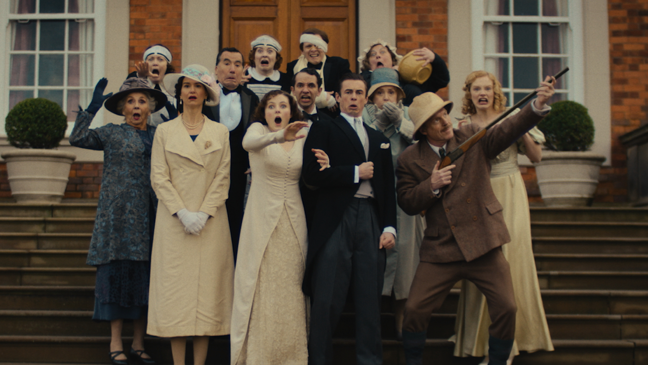 (L to R): Sue Johnston, Katherine Waterston, Tim McMullan, Thomasin McKenzie, Nathan McMullen, Ben Radcliffe, Damian Lewis, and Emma Laird in Bleecker Street's 'Fackham Hall.' Photo: Bleecker Street.