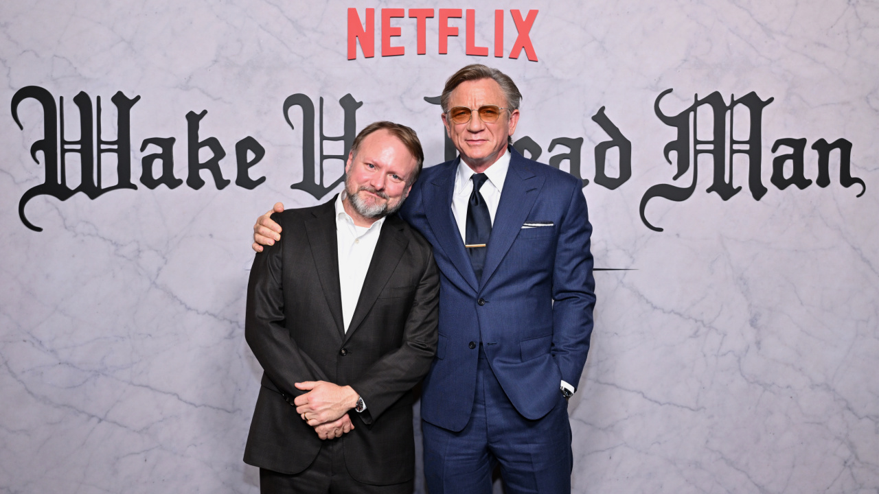 (L to R) 'Wake Up Dead Man: A Knives Out Mystery' director Rian Johnson and Daniel Craig. Cr. Courtesy of Netflix © 2025.