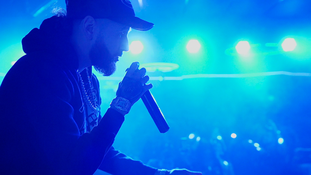 Chito (Jay Dee) performing on stage in 'Clika'. Photo: Sony Pictures. © 2025 CTMG, Inc. All Rights Reserved.