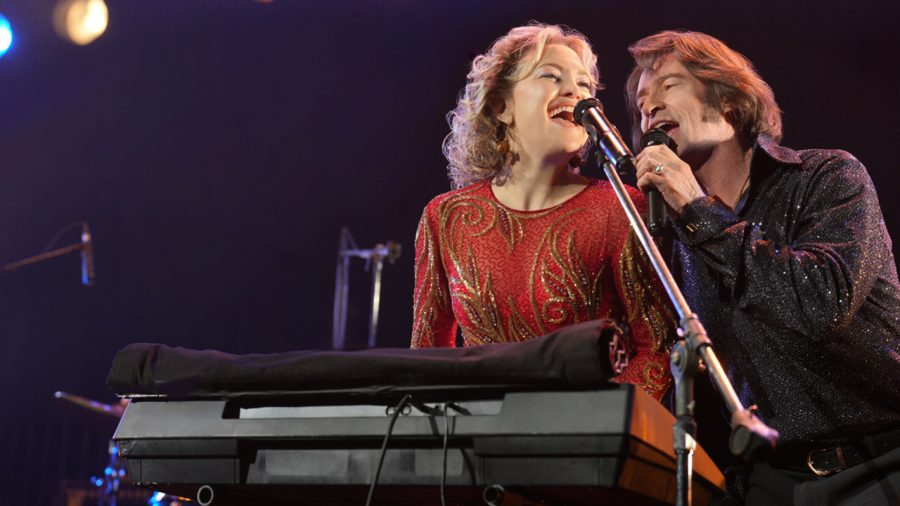 (L to R) Kate Hudson as Claire Sardina and Hugh Jackman as Mike Sardina in director Craig Brewer's 'Song Sung Blue', a Focus Features release. Credit: Sarah Shatz/Focus Features © 2025 All Rights Reserved.